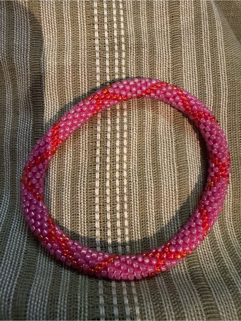 Hot pink Nogu glass bead roll on bracelet